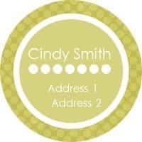 round sticker in green and white with light green polka dots