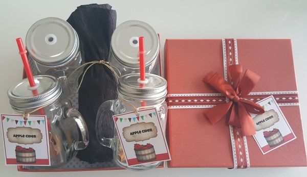 DIY gift box with glass mugs and apple cider